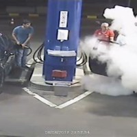 Gas Station Worker Sprays Cigarette Smoker With Fire Extinguisher