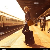 Lady At A Station